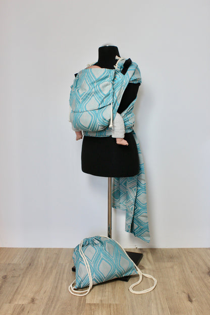 KAAMI | BuckleTai | komfortable Babytrage | Sparkling Peacock reverse - ADViKiDS