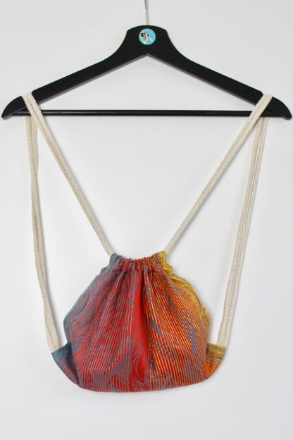 KAAMI | Tragetuch aus Bio-Baumwolle | Gr. 6 | 470cm | Dancing like a Rainbow Feather - ADViKiDS